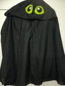 Kids Costumes to Hire - Black cape short - wih green eyes